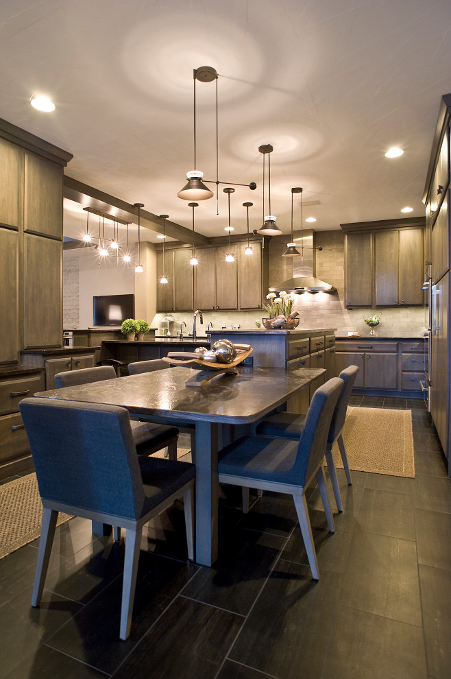 Inspiration for a contemporary eat-in kitchen in Other with flat-panel cabinets, dark wood cabinets and with island.