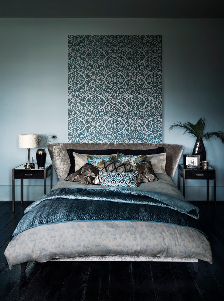 Photo of a world-inspired bedroom in London with feature lighting.