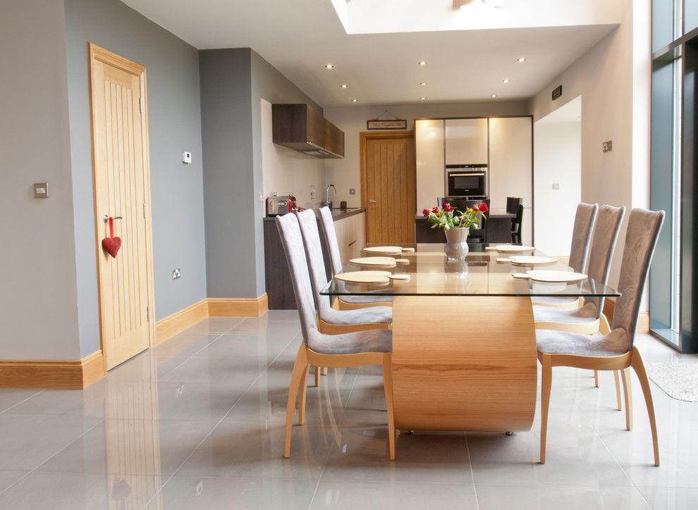 Transitional dining room in West Midlands.