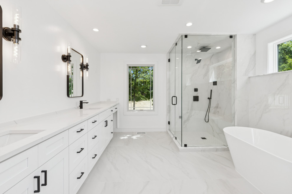 Sophisticated Spa Master Bath with Freestanding Tub, Glass Shower & Double Vanit