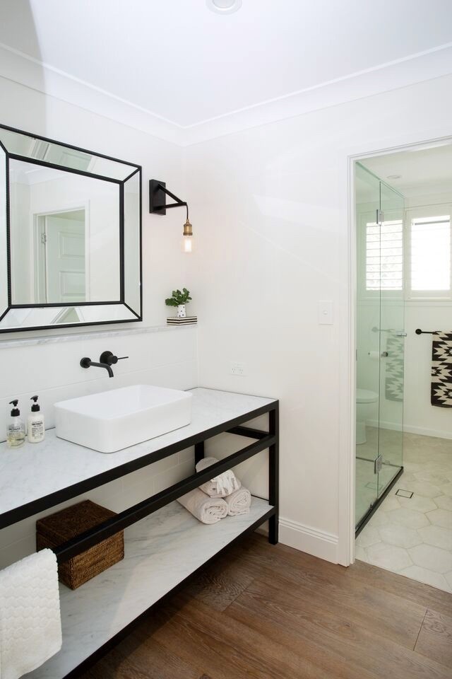 Large contemporary master bathroom in Brisbane with open cabinets.