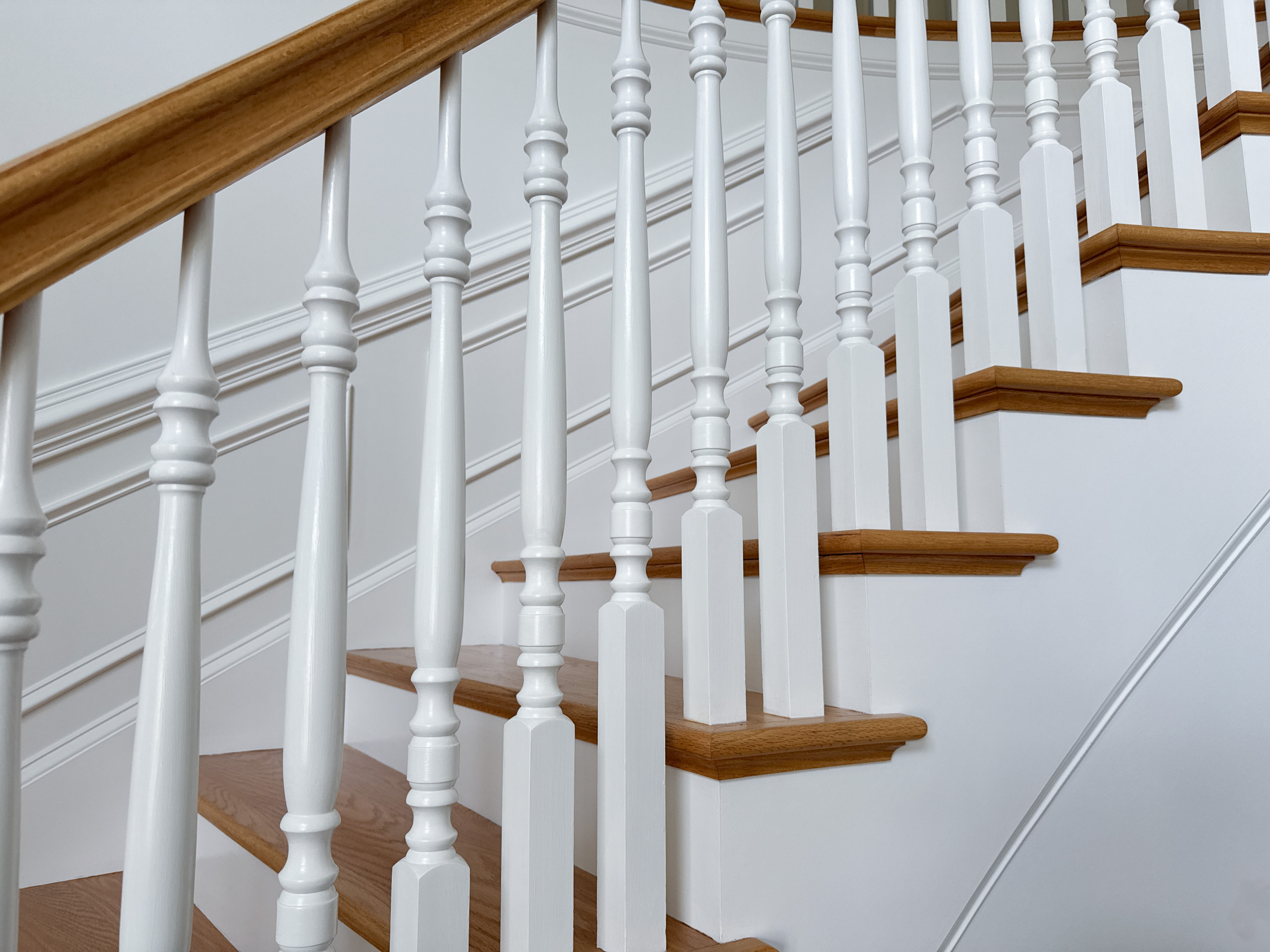 Project #161 | Curved Red Oak Foyer Staircase, 26 Years Later