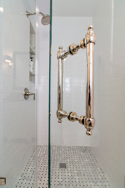 Large midcentury master bathroom in Los Angeles with furniture-like cabinets, white cabinets, a freestanding tub, an alcove shower, a bidet, gray tile, mosaic tile, white walls, mosaic tile floors, an undermount sink and marble benchtops.