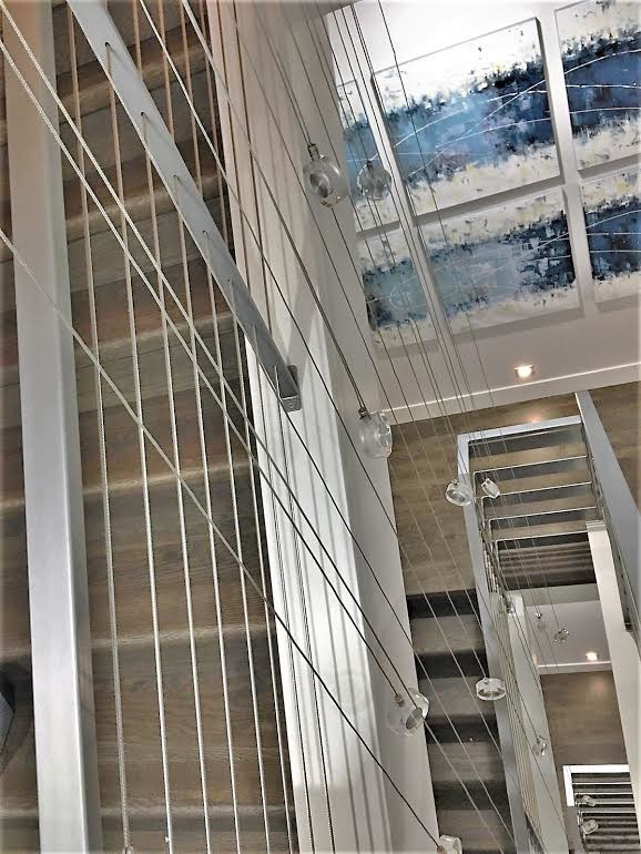 Home design - large transitional u-shaped metal railing home design idea in Denver