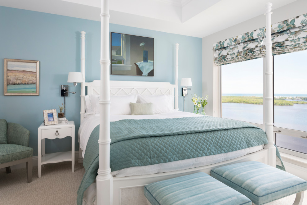 Inspiration for a mid-sized beach style guest bedroom in Other with blue walls, carpet, beige floor and recessed.
