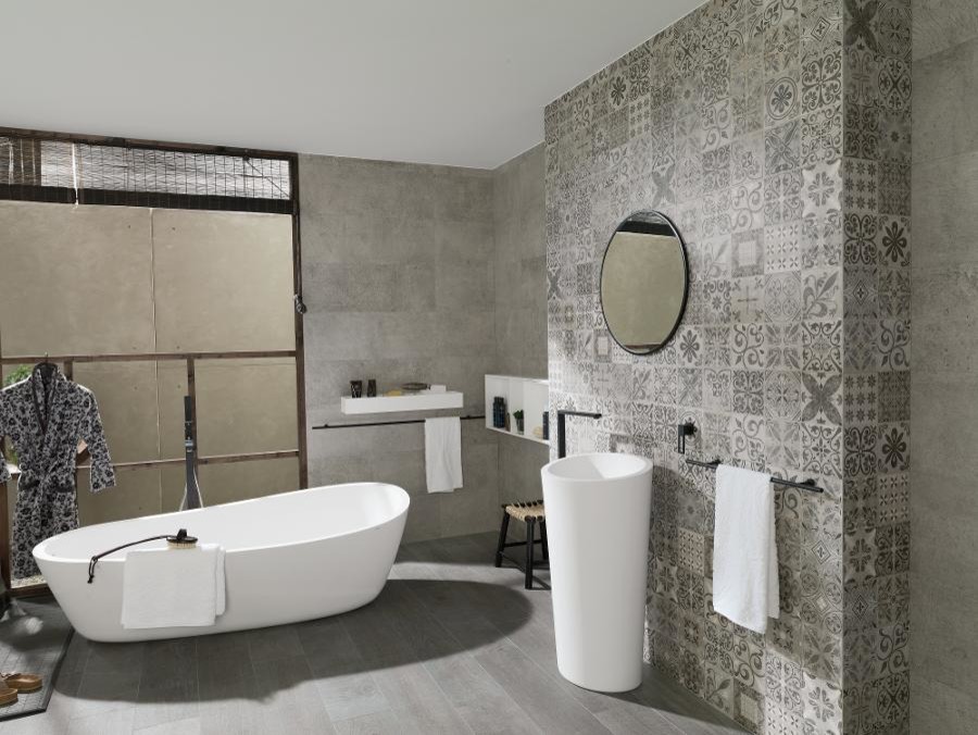 Large contemporary master bathroom in Denver with a pedestal sink, open cabinets, a freestanding tub, gray tile, porcelain tile, grey walls and porcelain floors.