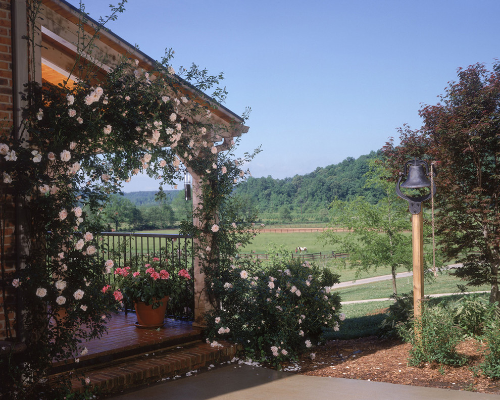 Inspiration for a country side yard verandah in Charlotte with a vertical garden, decking and a roof extension.