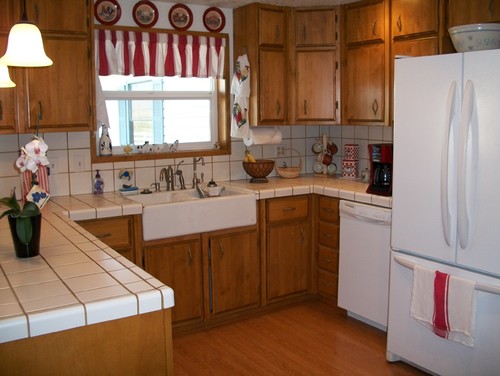 Should I Invest In New Kitchen Cabinets Or Re Face The Old Ones