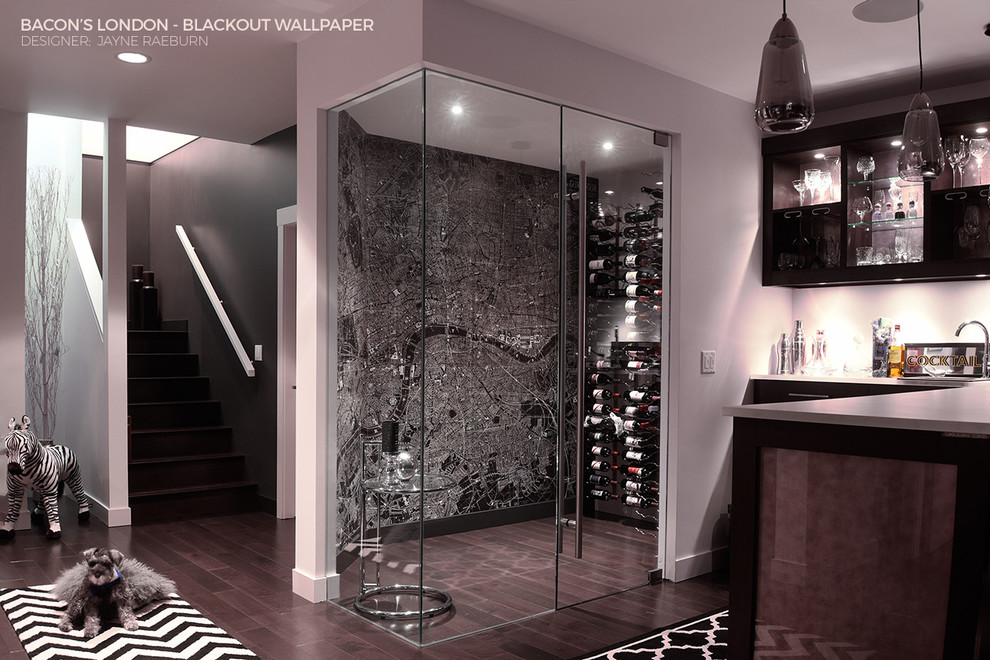 Inspiration for a small contemporary wine cellar in Vancouver with medium hardwood floors and storage racks.