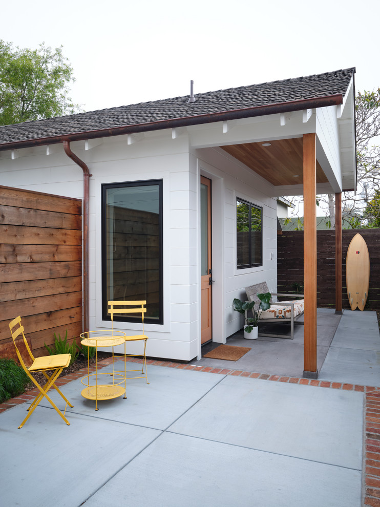 Example of a large beach style detached guesthouse design in San Francisco