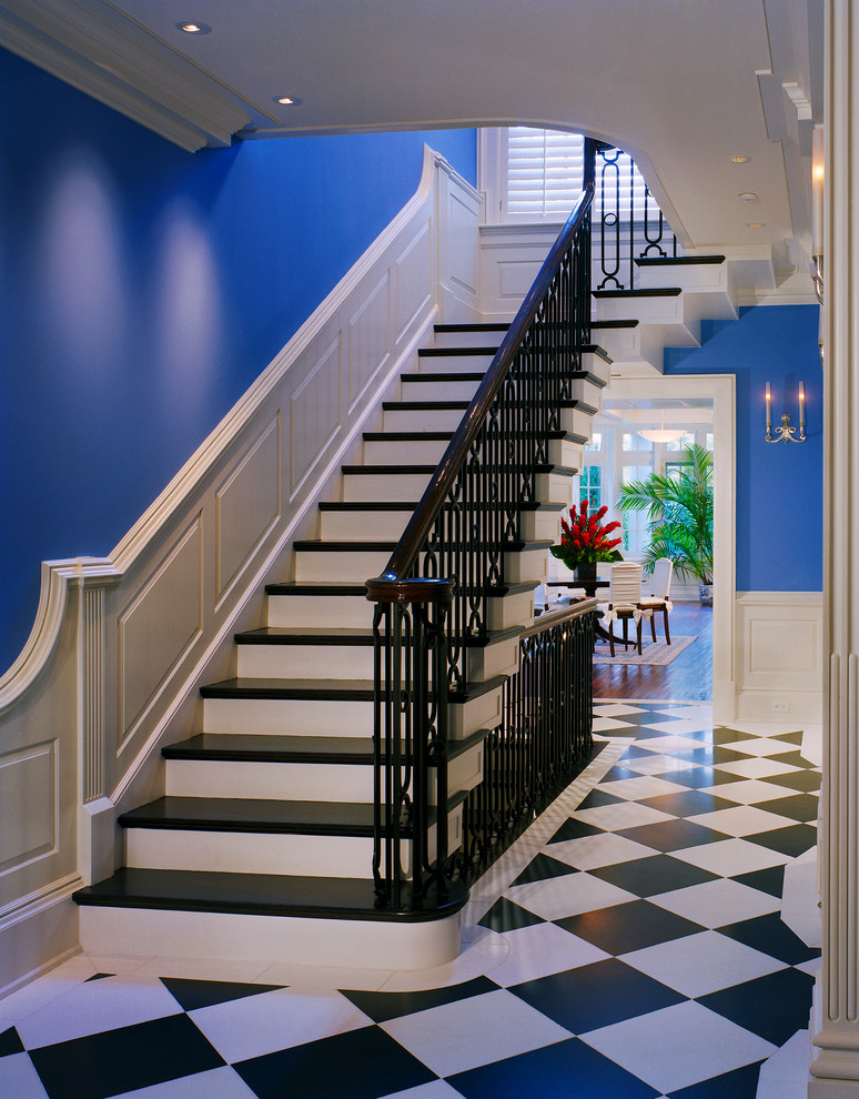 Mid-sized traditional foyer in DC Metro with blue walls, marble floors and multi-coloured floor.