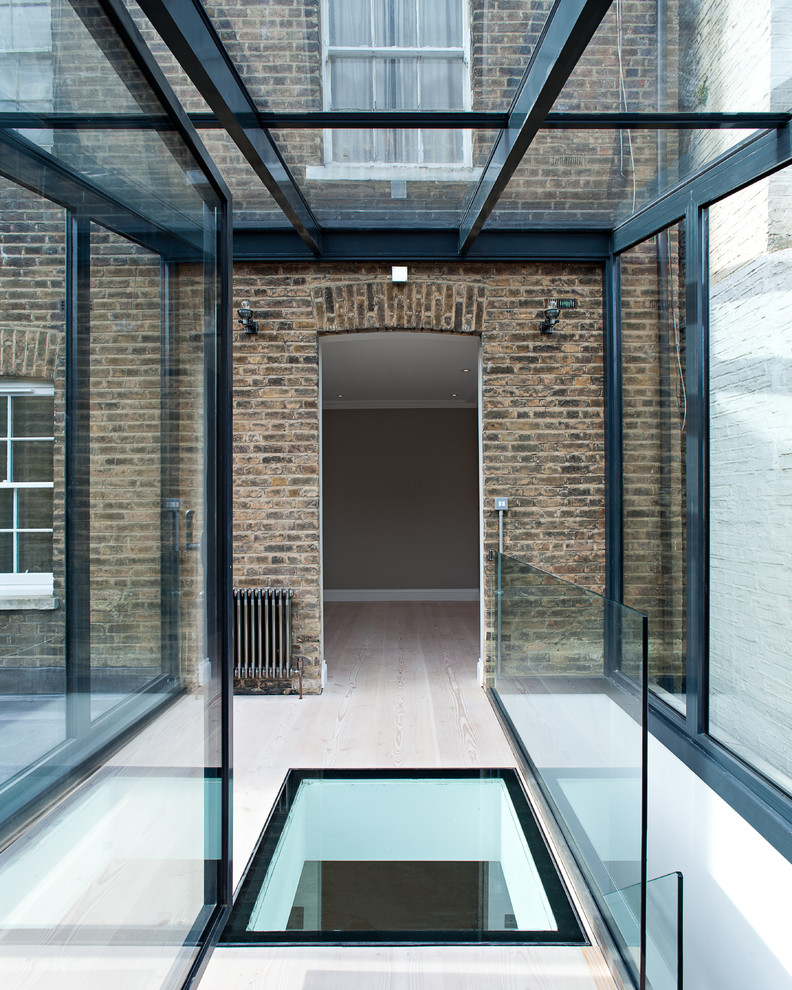 Inspiration for a contemporary sunroom in London.