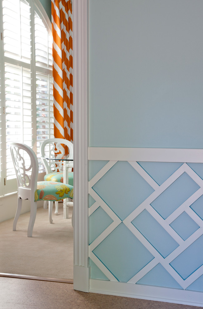 Inspiration for a mid-sized transitional hallway in Little Rock with blue walls.