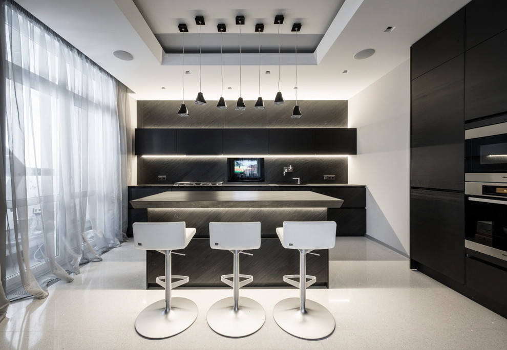 Photo of a contemporary kitchen in Moscow with with island, flat-panel cabinets, black cabinets and black splashback.