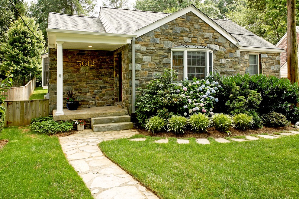 Photo of a contemporary exterior in DC Metro with stone veneer.