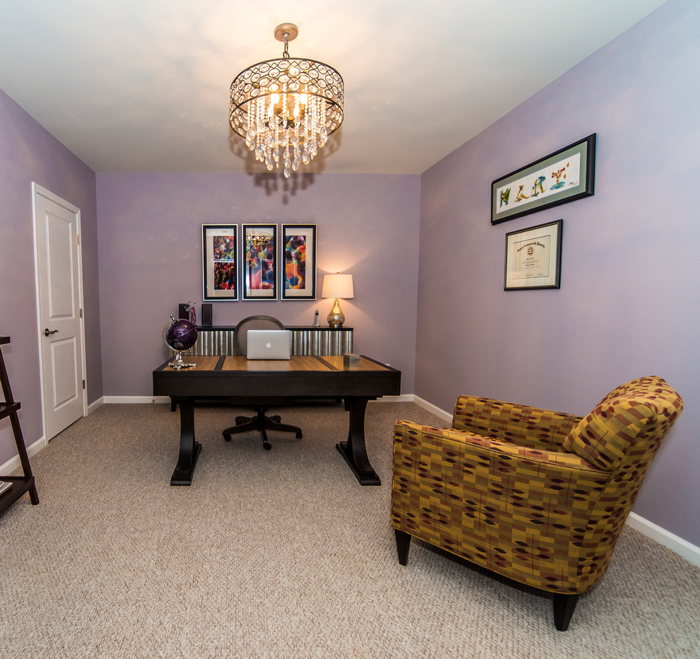 Design ideas for a mid-sized transitional study room in DC Metro with purple walls, carpet and a freestanding desk.