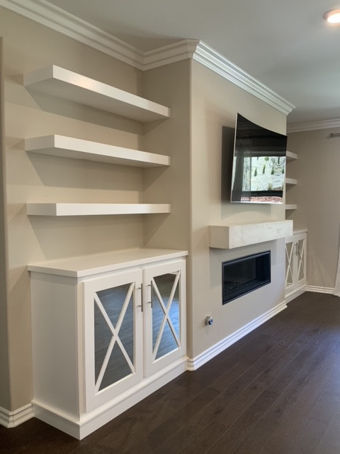 CUSTOM BUILT IN AND FIREPLACE MANTLE
