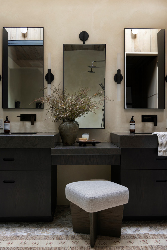 Inspiration for a rustic master double-sink bathroom remodel in Minneapolis with black cabinets, a one-piece toilet and an undermount sink