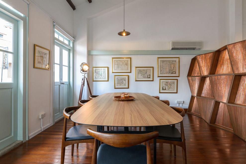 Mid-sized trendy dark wood floor home office photo in Singapore with no fireplace