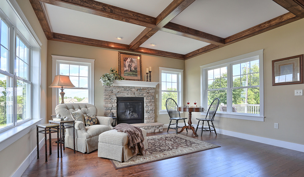 Inspiration for a mid-sized arts and crafts formal enclosed living room in Other with a standard fireplace, a stone fireplace surround, beige walls, dark hardwood floors, no tv and brown floor.