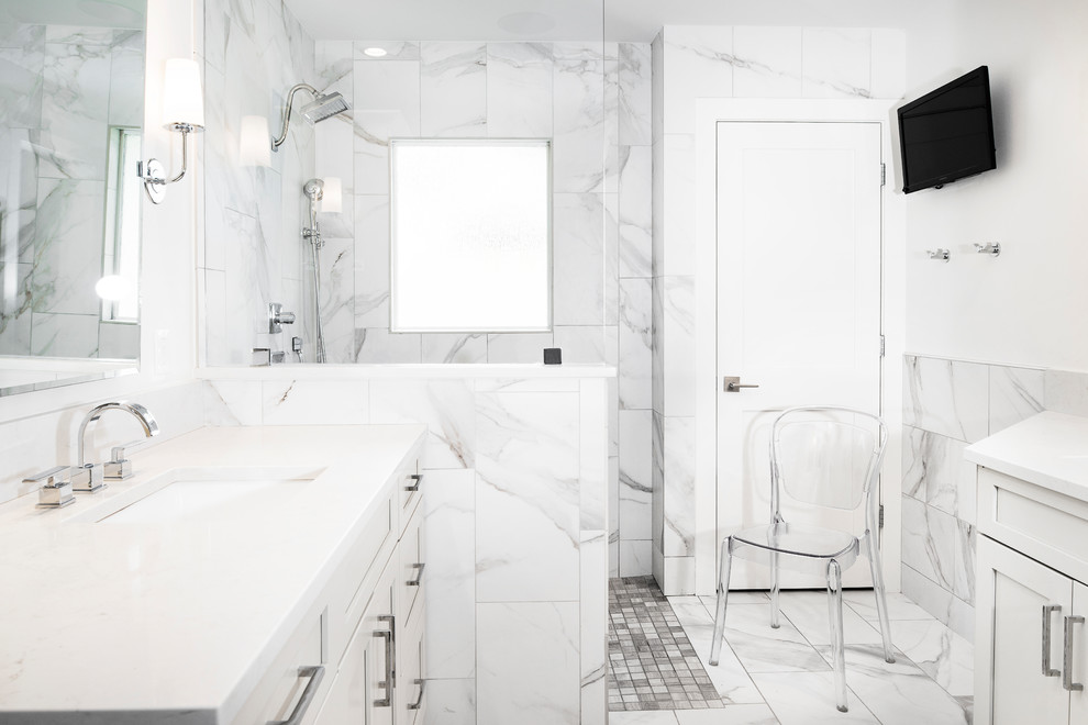 Design ideas for a mid-sized transitional master bathroom in Other with shaker cabinets, white cabinets, an open shower, gray tile, white tile, an undermount sink, white floor, an open shower, marble, quartzite benchtops, a freestanding tub and white walls.