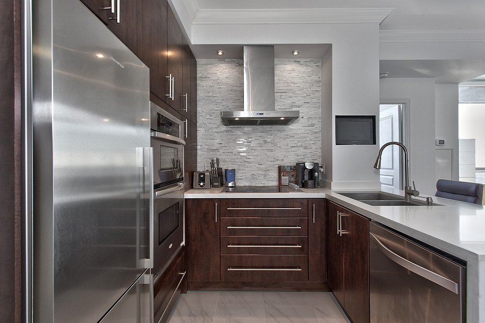 Design ideas for a contemporary kitchen in Toronto with a double-bowl sink, flat-panel cabinets, medium wood cabinets, grey splashback, matchstick tile splashback, stainless steel appliances and no island.