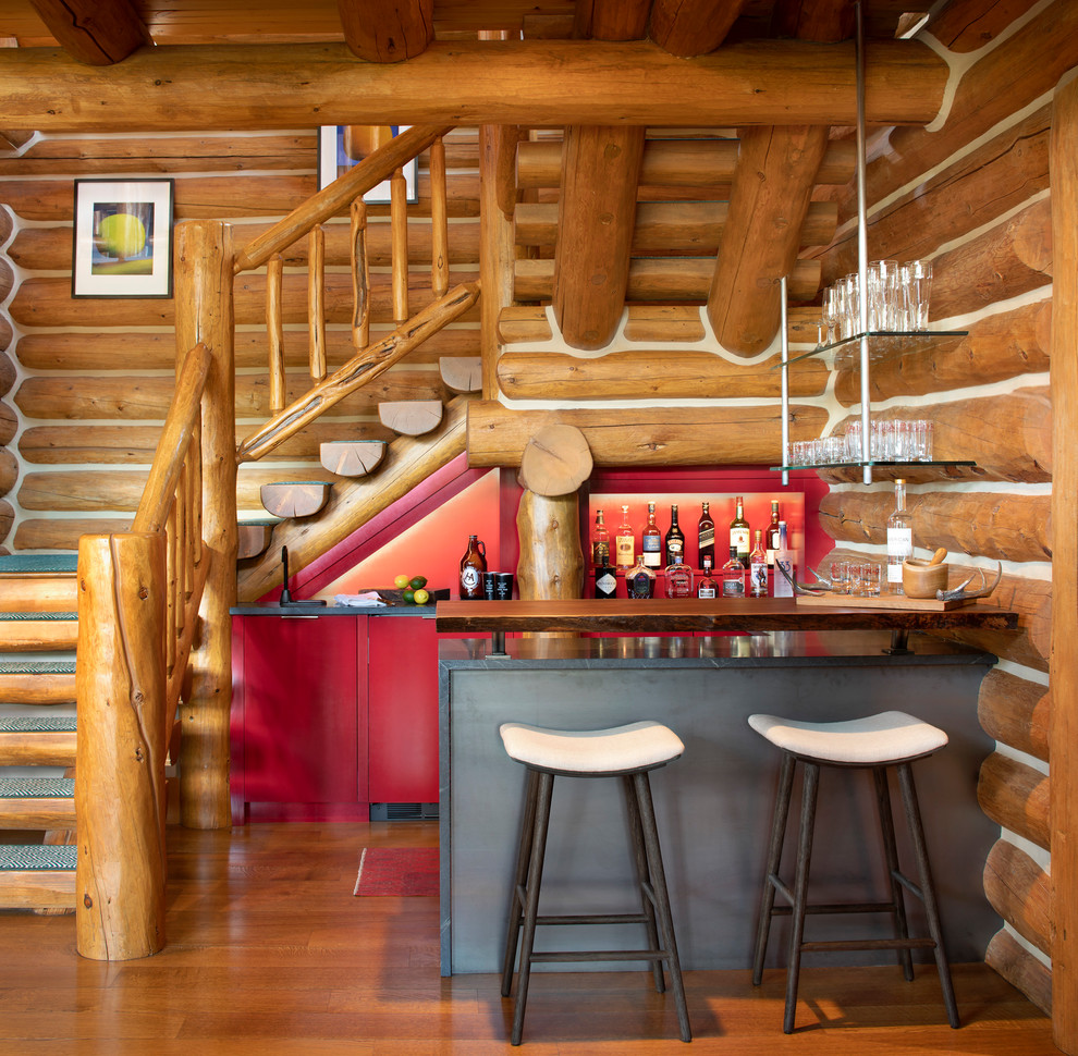 This is an example of a country home bar in Other.