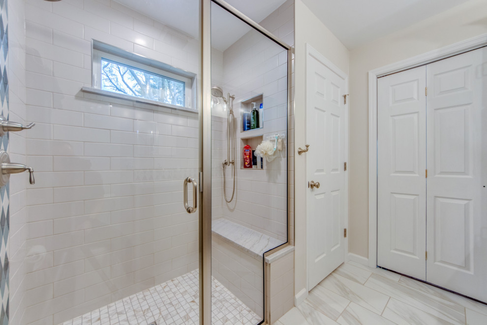 Medium sized traditional bathroom in St Louis with raised-panel cabinets, dark wood cabinets, a built-in shower, white tiles, ceramic tiles, a submerged sink, engineered stone worktops, a hinged door, white worktops, double sinks, a built in vanity unit, grey walls, porcelain flooring, beige floors and a laundry area.