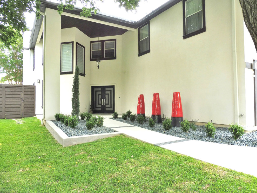 Mid-sized modern front yard partial sun garden in Dallas with a garden path and gravel.
