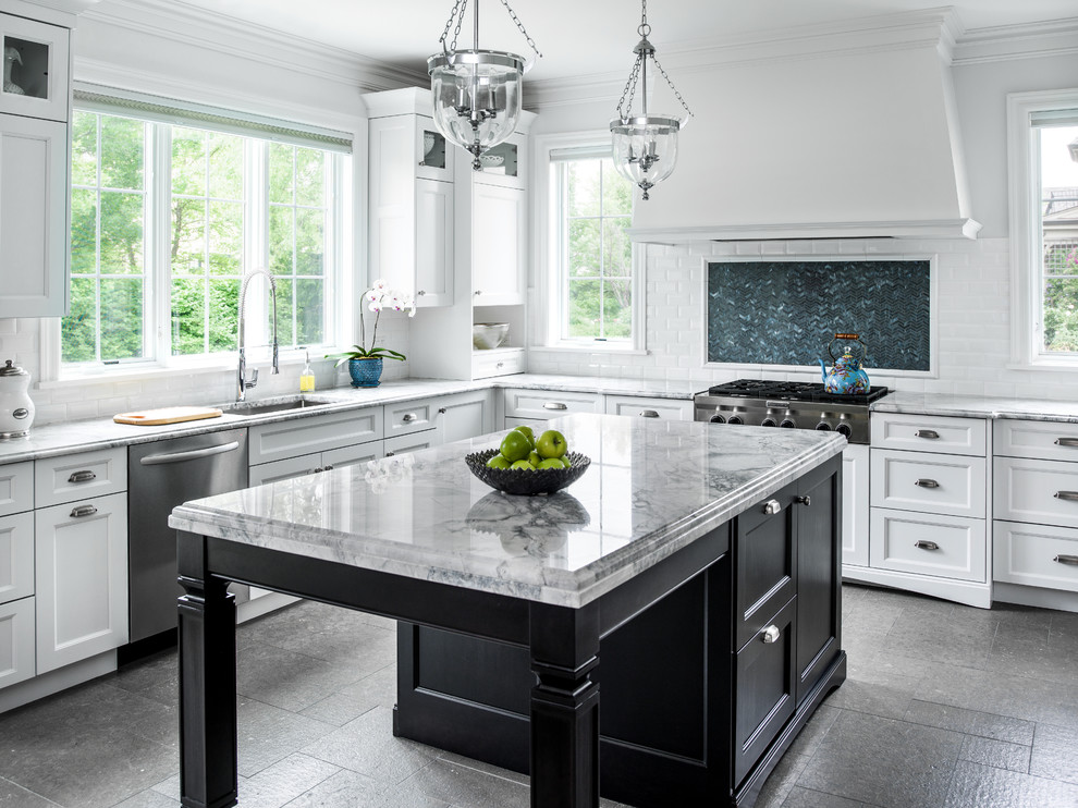 Inspiration for a traditional kitchen in Chicago with an undermount sink, shaker cabinets, white cabinets, marble benchtops, white splashback, subway tile splashback, stainless steel appliances and with island.