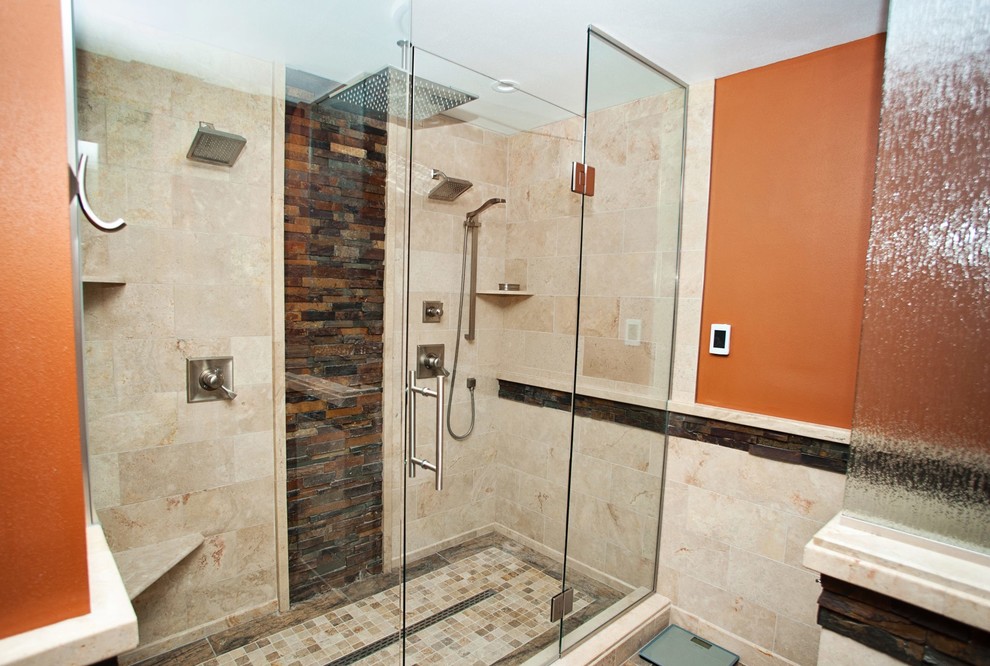 Inspiration for a large country master bathroom in Milwaukee with recessed-panel cabinets, medium wood cabinets, a double shower, beige tile, travertine, cement tiles, an undermount sink, granite benchtops and a hinged shower door.