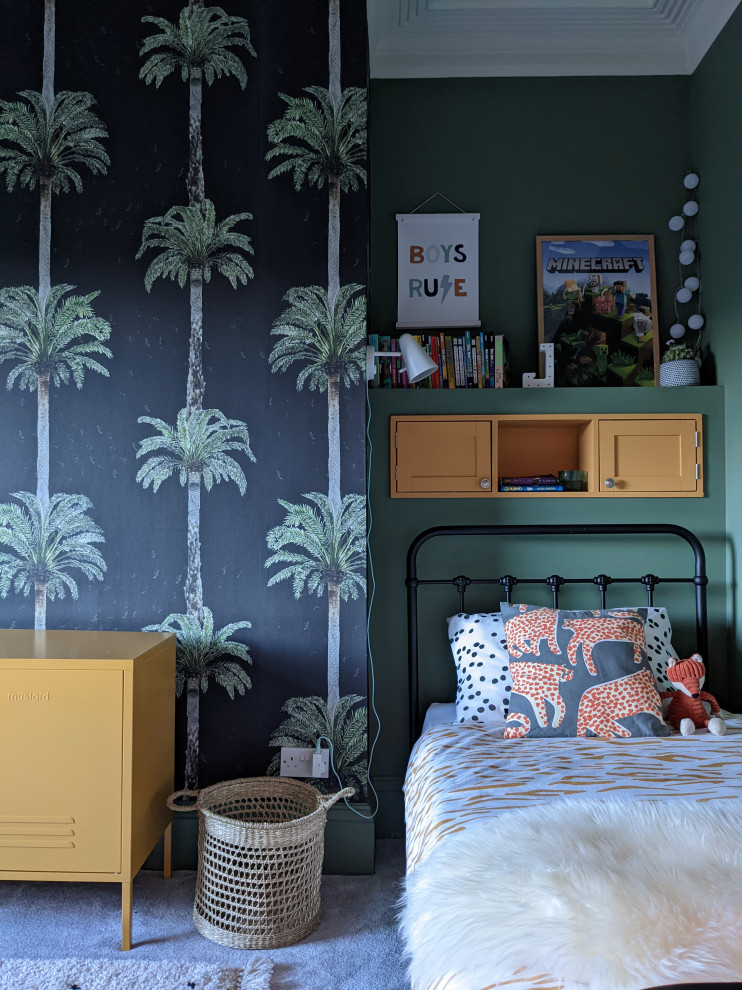This is an example of a mid-sized eclectic gender-neutral kids' bedroom for kids 4-10 years old in Other with green walls, carpet and grey floor.
