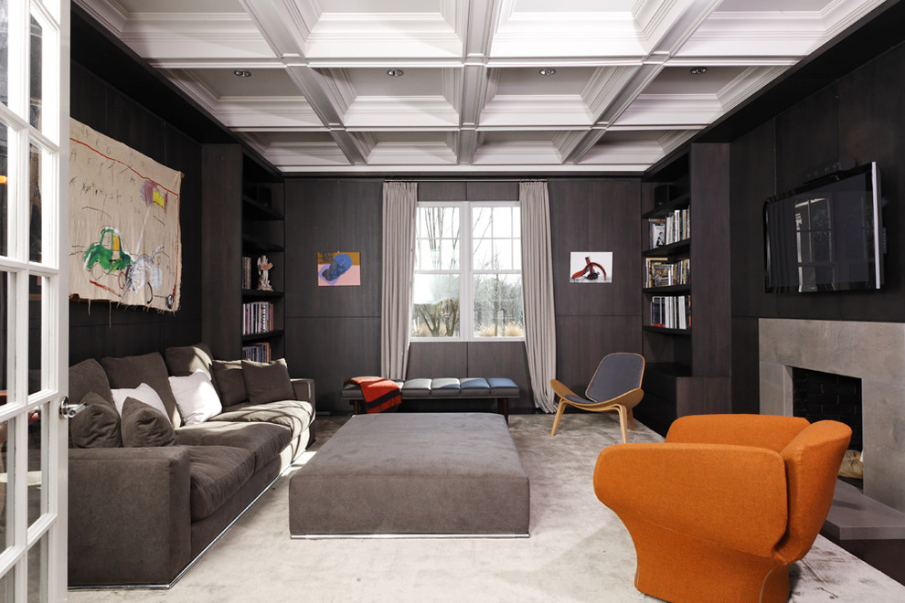 Design ideas for a contemporary family room in New York with a concrete fireplace surround.