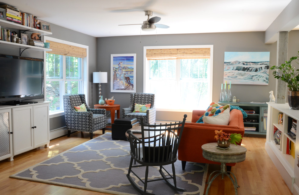 Example of a beach style living room design in Portland Maine