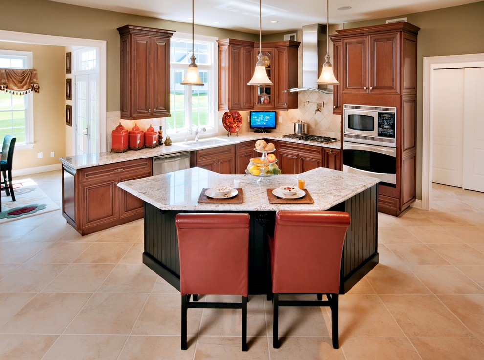 Inspiration for a contemporary ceramic tile kitchen remodel in New York with an undermount sink, granite countertops, stainless steel appliances, an island, dark wood cabinets and brown backsplash