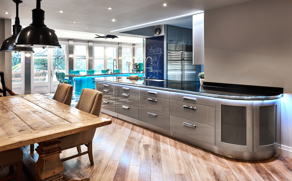Photo of a large contemporary eat-in kitchen in Other with quartzite benchtops.