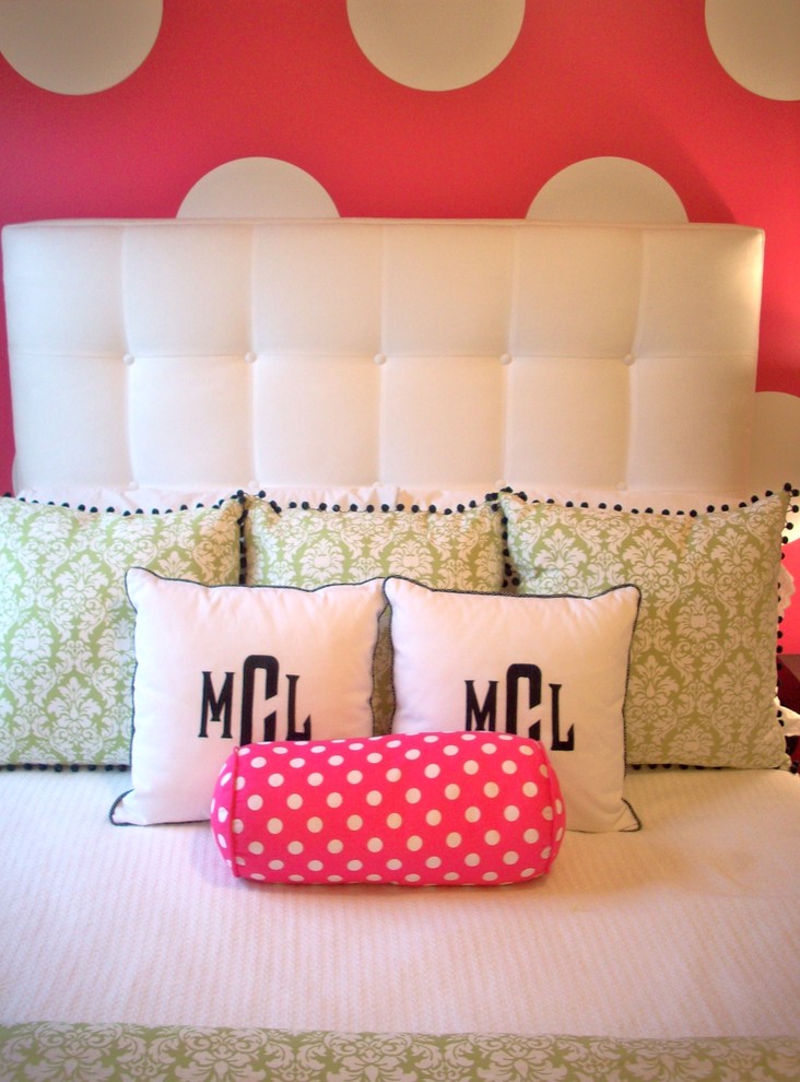 Trendy girl kids' room photo in Charlotte with pink walls