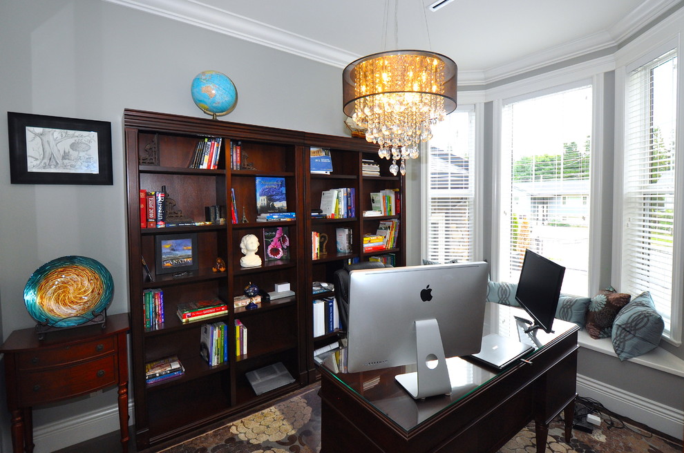 Inspiration for a large timeless freestanding desk dark wood floor and brown floor study room remodel with white walls