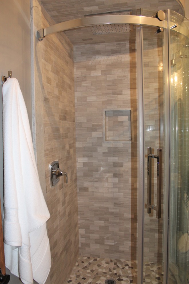 Inspiration for a rustic gray tile and subway tile pebble tile floor corner shower remodel in Toronto with furniture-like cabinets, dark wood cabinets, a two-piece toilet, gray walls, a drop-in sink and wood countertops