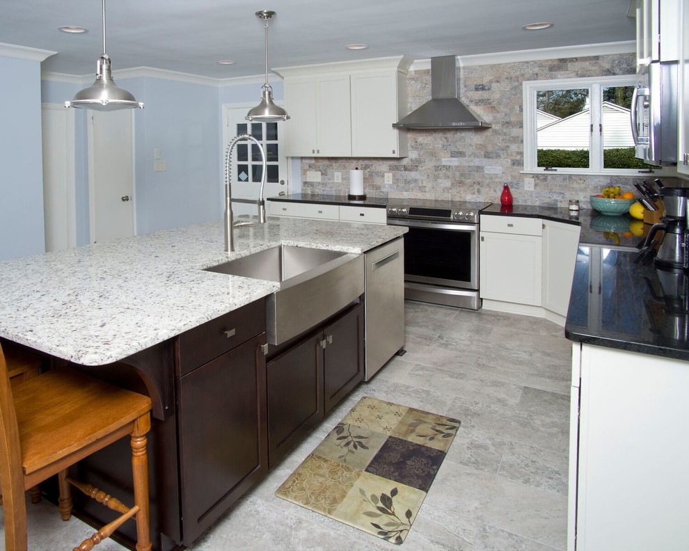 Eat-in kitchen - large transitional u-shaped ceramic tile and gray floor eat-in kitchen idea with a farmhouse sink, white cabinets, granite countertops, multicolored backsplash, subway tile backsplash, stainless steel appliances, an island and shaker cabinets