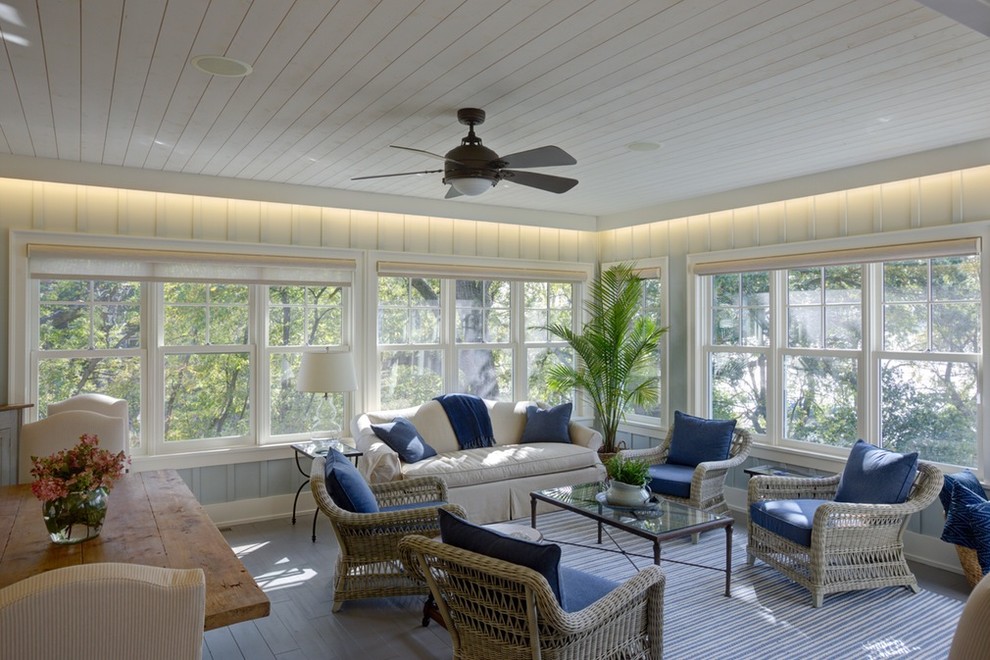 Photo of a large transitional sunroom in Minneapolis with no fireplace and a standard ceiling.