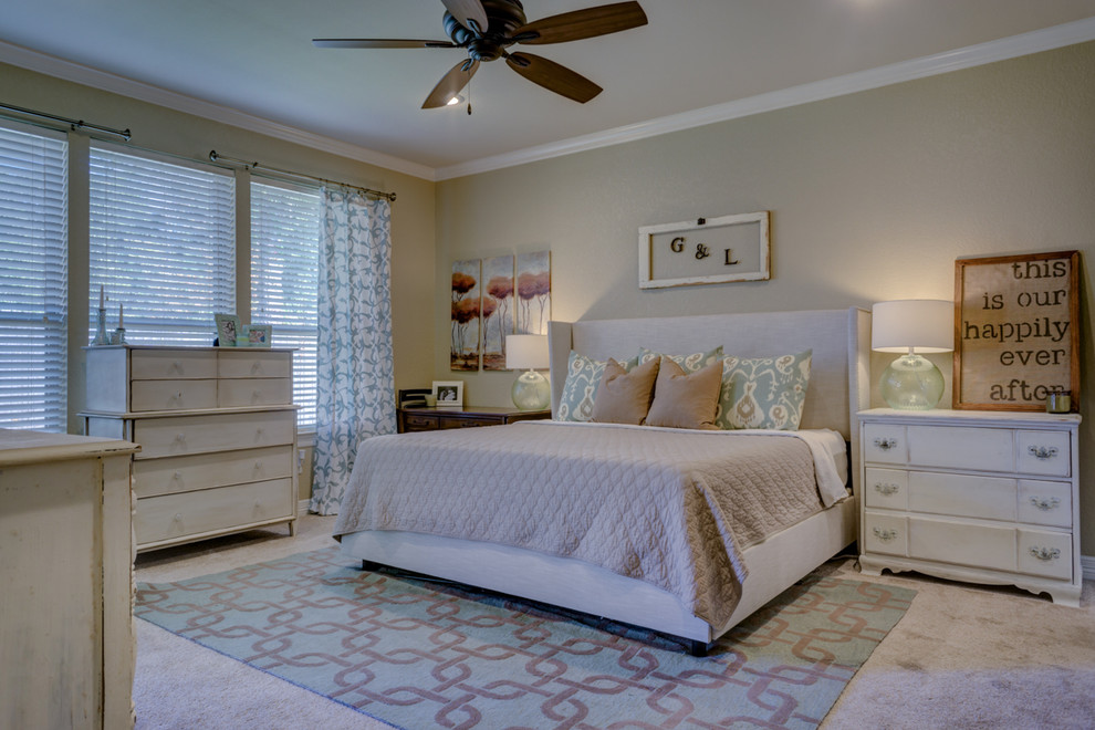Inspiration for a large timeless master carpeted bedroom remodel in Austin with beige walls and no fireplace