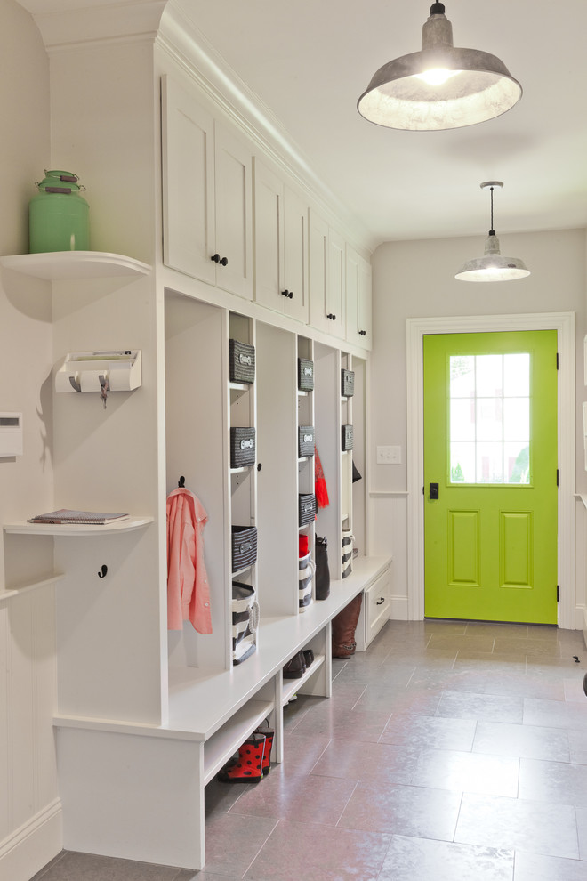 Inspiration for a traditional mudroom in Boston with white walls, a single front door and a green front door.