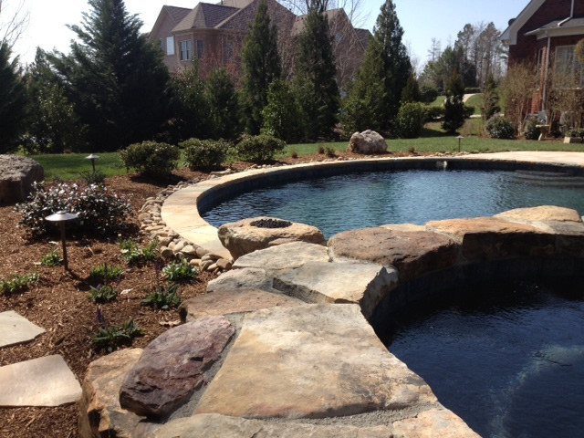 Mountain style home design photo in Charlotte