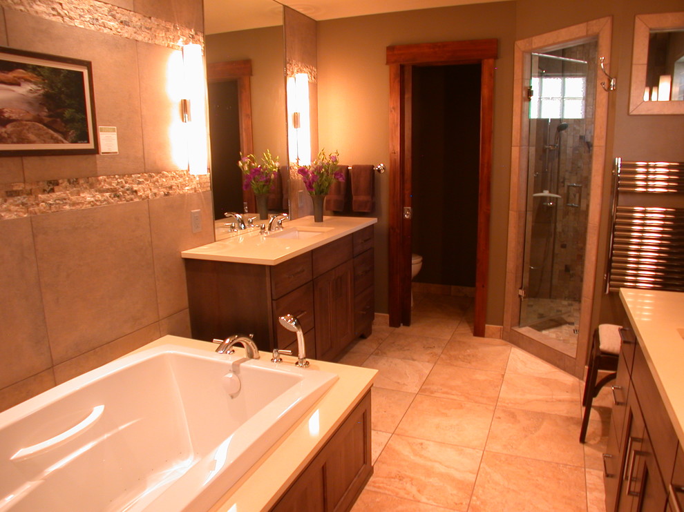 Large arts and crafts master bathroom in Denver with flat-panel cabinets, distressed cabinets, a drop-in tub, a corner shower, beige walls, ceramic floors, a drop-in sink and engineered quartz benchtops.