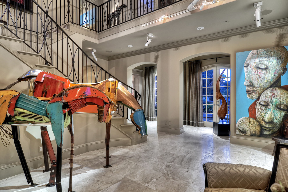 Example of a large transitional ceramic tile foyer design in Orange County with white walls and a glass front door