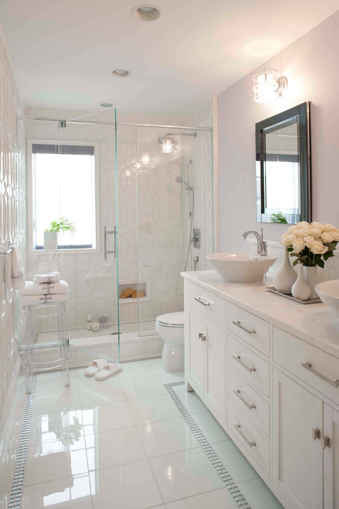Mid-sized transitional bathroom in New York with a vessel sink, shaker cabinets, white cabinets, an alcove shower, white tile, marble benchtops, glass tile, purple walls, white floor and white benchtops.