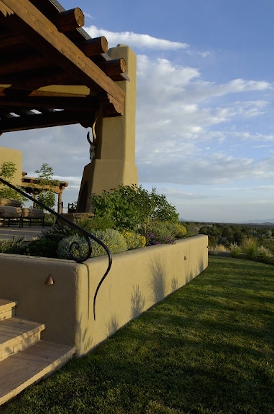 Design ideas for a large drought-tolerant and partial sun backyard landscaping with decking.