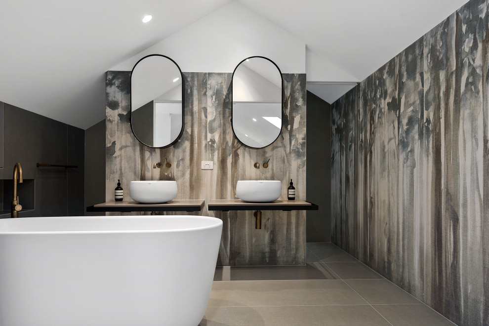 Inspiration for a mid-sized country master bathroom in Melbourne with dark wood cabinets, a freestanding tub, an alcove shower, multi-coloured tile, white walls, a vessel sink, granite benchtops, an open shower, brown benchtops, a double vanity and a floating vanity.