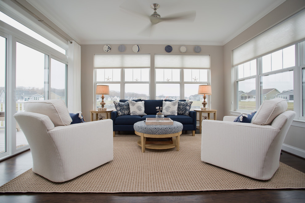 This is an example of a mid-sized beach style sunroom in Other with medium hardwood floors, no fireplace, a standard ceiling and brown floor.